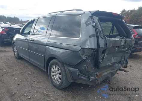 2010 Honda Odyssey Ex-L z USA, uszkodzony, nr VIN 5FNRL3H68AB018547